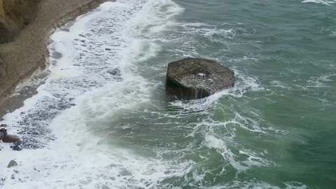 Drone flying over raw landscape, and a WWII bunker in Denmark, drone stock Stock Footage 138697025
