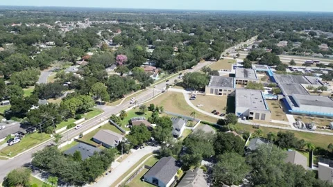 Drone flying over residential houses over Valrico FL 33596 Stock Footage 254907853