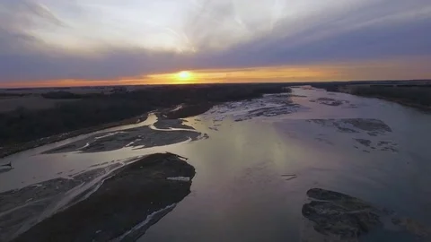 Drone Flying Over River Ascending To Sunset Stock Footage 78869465