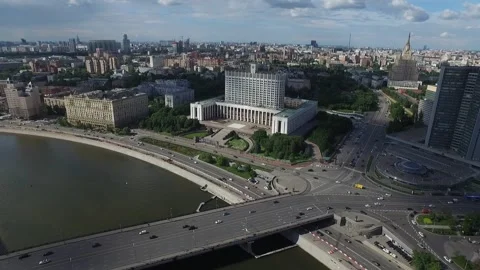 Drone flying over river bridge and government building Stock Footage 328993983