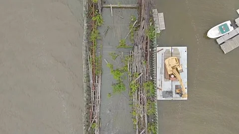 Drone Flying over River on a Cloudy Day with Shipwreck Stock Footage 311288123
