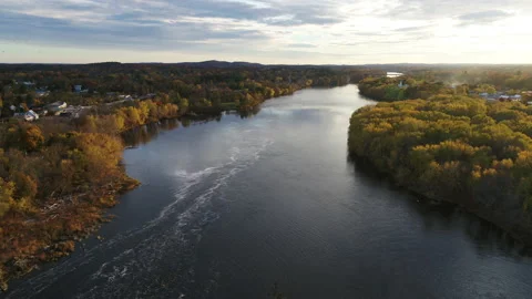 Drone Flying Over River With Current In Autumn Stock Footage 229160608