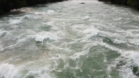Drone flying over river rapids with water splashing  Stock Footage 280009343