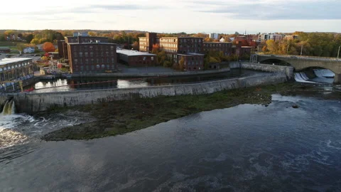 Drone Flying Over River Toward Factory In Autumn Stock Footage 229159780