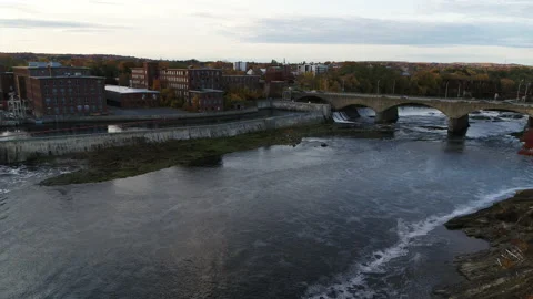 Drone Flying Over River Toward Factory With Busy Bridge In Autumn Stock Footage 229160609