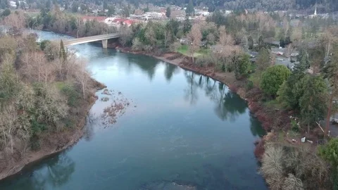 Drone Flying Over River Towards Bridge Video stock 84081916