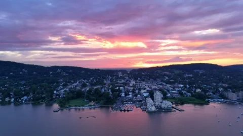 Drone Flying over Riverside Town w/ Epic Sunset Stock Footage 313702827