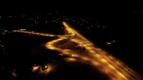 Drone flying over the road at night 스톡 동영상 249199701