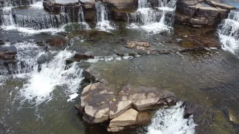 Drone flying over rocky stream with flowing water 스톡 동영상 289550911