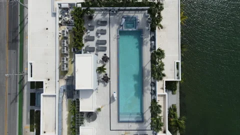 Drone Flying Over Rooftop Pool Stock Footage 248613318