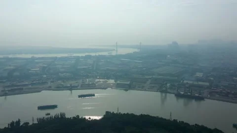 Drone flying in over Saigon river and port in Ho Chi Minh City, Vietnam Stock Footage 166817699