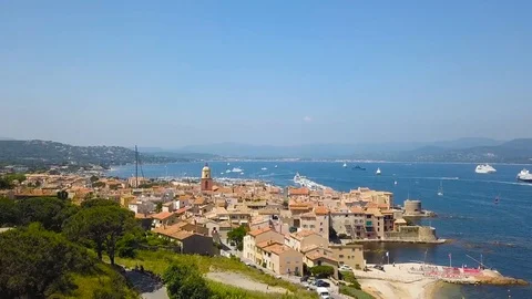 Drone flying over Saint-Tropez during summer with marina in background Stock Footage 101650050