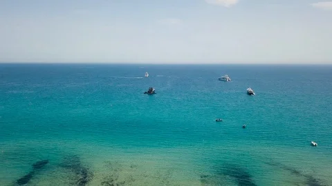 Drone flying over Saint-Tropez during summer with marina in background 스톡 동영상 101650135