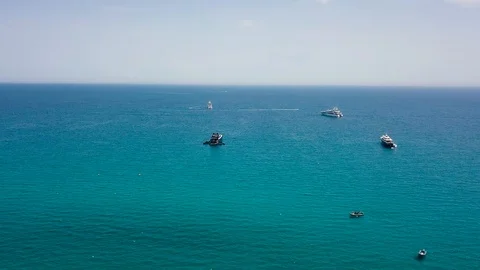 Drone flying over Saint-Tropez during summer with yachts in the background Stock Footage 101650216