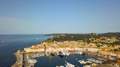 Drone flying over Saint-Tropez during summer with marina in background Stock Footage 101650526