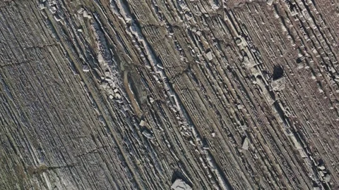 Drone flying over Sakoneta beach flysch formations in Basque Country 스톡 동영상 334255437