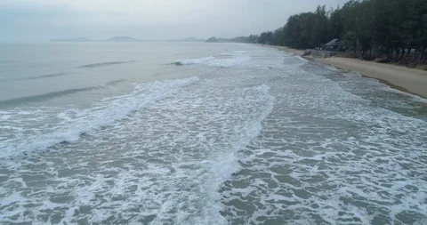 Drone flying over the sea during the morning mist at Mae Pim beach Rayong Stock Footage 108414683