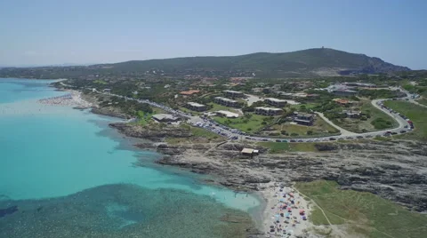 Drone flying over seacoast with shallow blue water Vídeo Stock 59832987