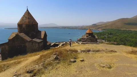 Drone flying over Sevanavank monastery complex, sightseeing in Armenia, religion Stock Footage 85867119