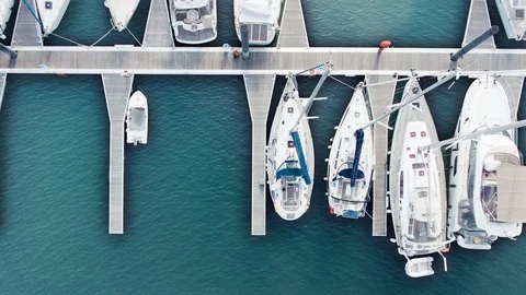 Drone flying over Ships in Dock 스톡 동영상 73975839