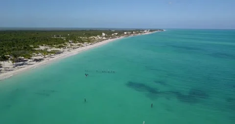 Drone flying over the shore of a beach in the Caribbean. Video stock 274784613