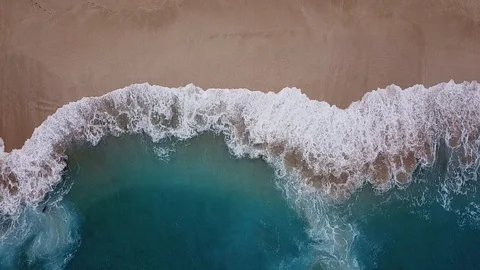 Drone flying over shorebreak ocean Stock Footage 100992483