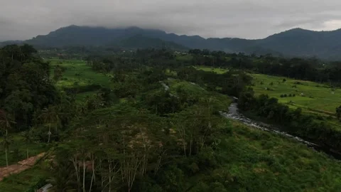 Drone Flying over Sidemen fields and river Stock Footage 303574153