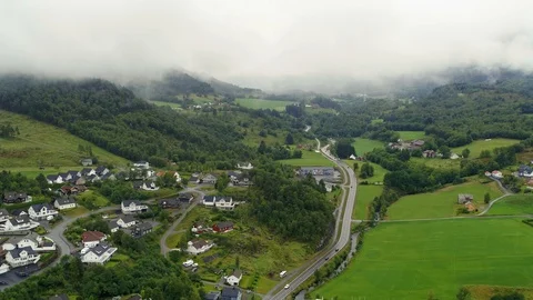 Drone flying over small Norwegian town in the mountains, drone stock footage Video stock 127515973
