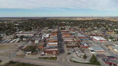 Drone Flying Over Small Rural Town Along Street Over Buildings Stock Footage 229183721