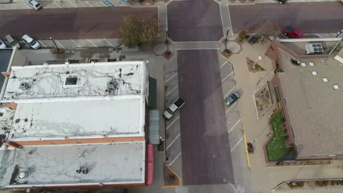 Drone Flying Over Small Rural Town Along Street Pointed At The Ground Stock Footage 229183930