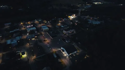 Drone Flying Over Small Town at Night Stock Footage 167193294