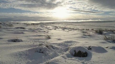 Drone Flying over snow reflecting the sun, journey, sunset, halifax, yorkshire Stock Footage 89351092