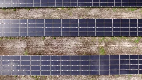Drone flying over solar panels for renewable energy Video stock 343831714