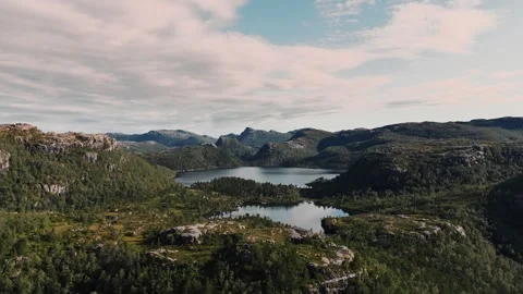 Drone flying over spectacular norwegian mountains and lakes Stock Footage 318372453