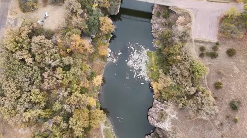 Drone flying over Split Rock Creek running through Palisades State Park in Stock Footage 290775184
