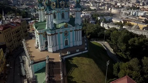 Drone flying over St Andrew's Church on top of the Andriyivskyy Descent in Kiev, Stock Footage 114677600