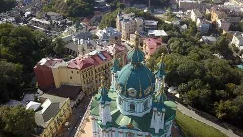 Drone flying over St Andrew's Church on top of the Andriyivskyy Descent in Kiev, Stock Footage 114677604