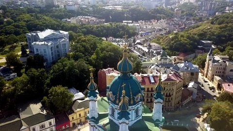 Drone flying over St Andrew's Church on top of the Andriyivskyy Descent in Kiev, Stock Footage 114677755