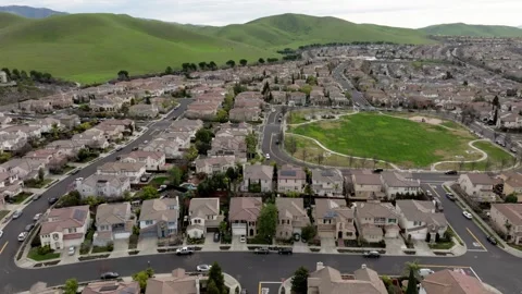 Drone Flying Over Suburbia, Orderly Houses Lined up in American Subdivision Stock Footage 305658171