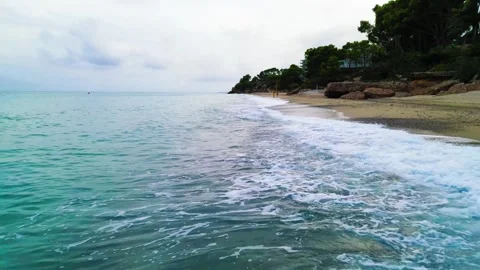 Drone flying over the surf line in the area of Miami Playa Stock Footage 253872864
