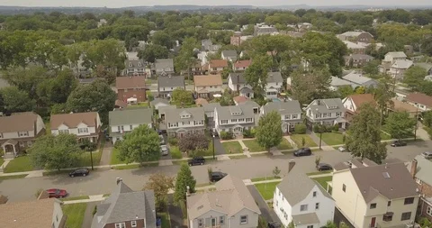 Drone Flying over town moving straight outside of NY 動画素材 94183398
