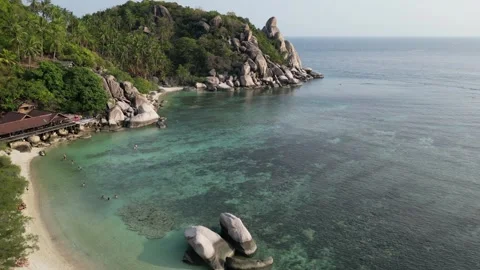 Drone Flying Over Tropical Beach and Turquoise Ocean in Koh Tao, Thailand Stock Footage 335582937
