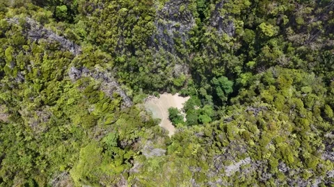 Drone Flying Over Tropical Limestone Karsts and Hidden Beach in Ko Mook, Ko Muk, Video stock 336009582