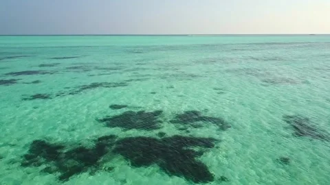 Drone Flying Over The Turquoise Ocean Water In Maldives Indian Ocean Stock Footage 196425194