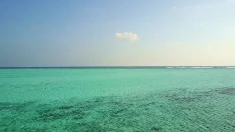 Drone Flying Over The Turquoise Ocean Water In Maldives Indian Ocean 2 Stock Footage 197673876