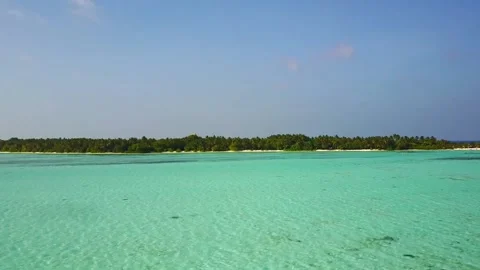 Drone Flying Over The Turquoise Ocean Water And Island In Maldives Stock Footage 198526030