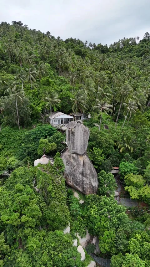Drone Flying Over a Unique Balanced Rock Formation in Koh Samui, Thailand Stock Footage 335830078