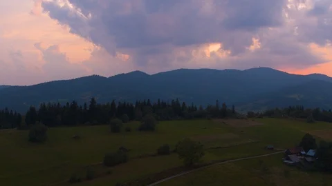 Drone flying over the valley towards the mountains in the evening 4k HDR H264 Stock Footage 88271404