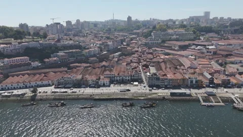 Drone flying over Vila Nova de Gaia waterfront in Porto, Portugal Stockbeeldmateriaal 348398158