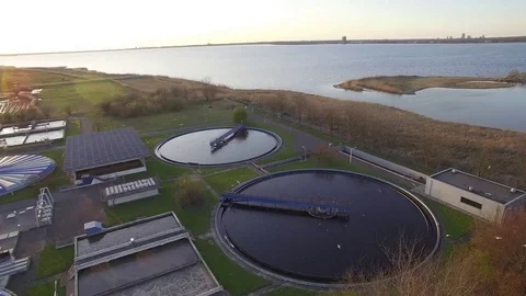 Drone flying over a water purification facility in the Netherlands Stock Footage